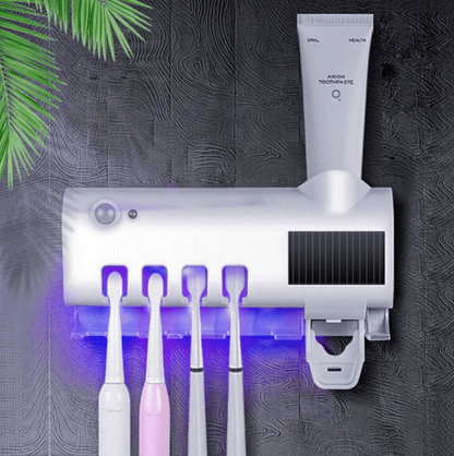 PORTACEPILLOS CON ESTERILIZADOR DE LUZ UV Y DISPENSADOR DE CREMA DENTAL😁